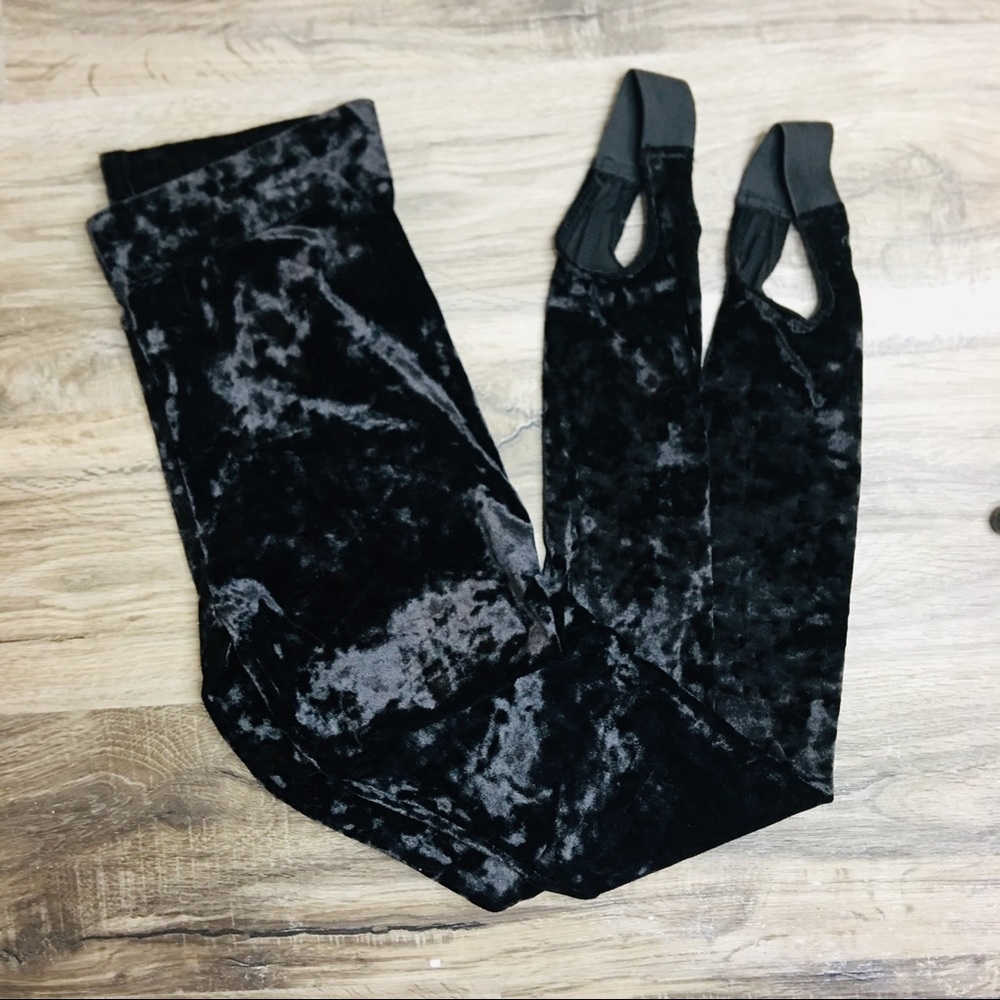 Black velvet stirrup pants